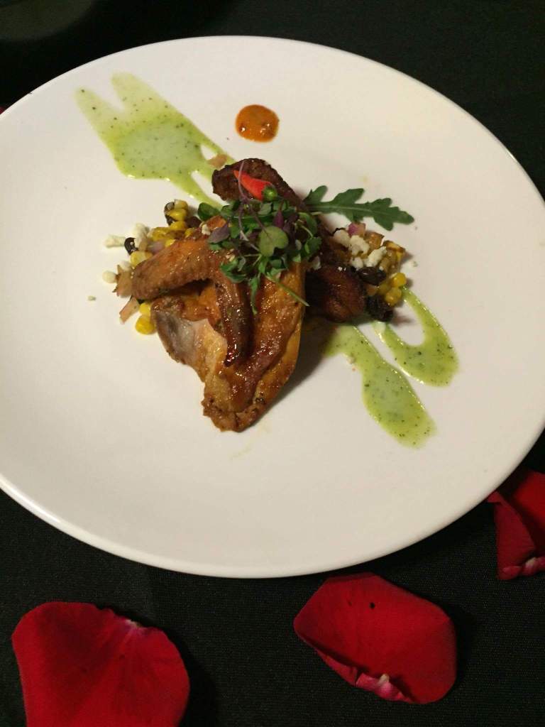 COURSE TWO: Chipotle Glazed Hen, Charred Black Bean Corn Salad, Cojita, Arugula, Chipotle Aioli, Jalapeno Cilantro Crema, Plantain