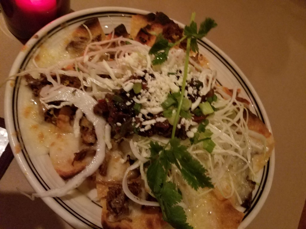 These nachos with slow roasted pork were soooo good!